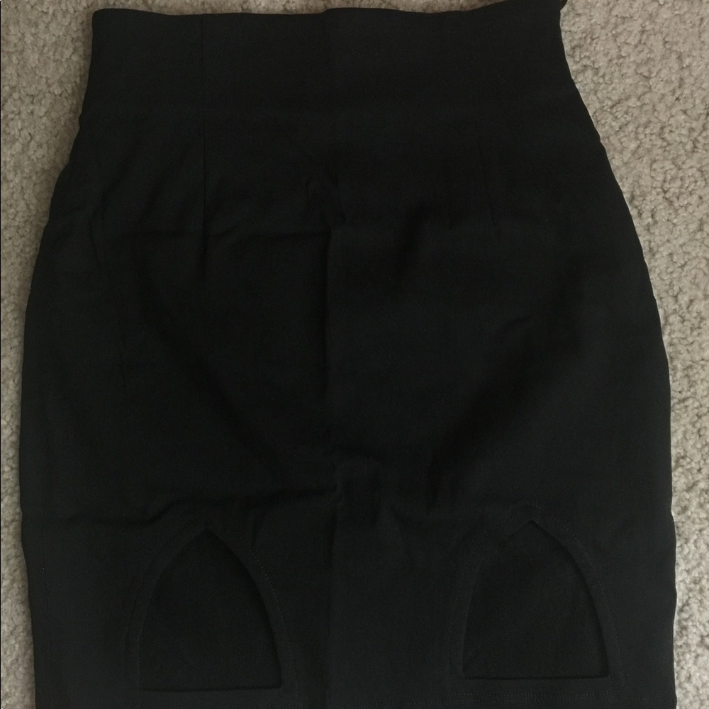 Pencil skirt with cutout detailing at the bottom!